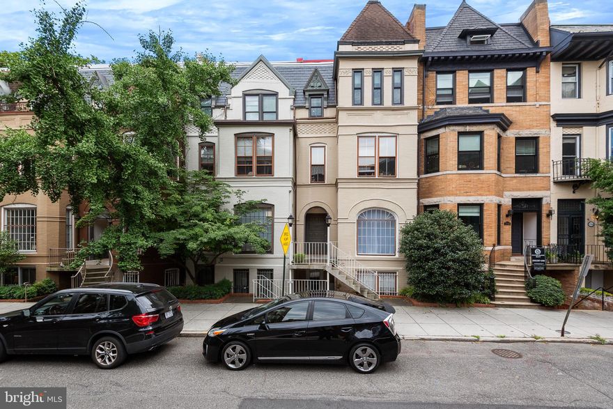 Stunning Top-Floor Condo in the Heart of Dupont Circle!

Nestled on one of Dupont Circle’s most charming and quiet streets, this spacious top-floor condominium offers the perfect blend of modern luxury and classic character. Sunlight pours into the unit, highlighting elegant marble floors, exposed brick accents, and a dual-sided fireplace that enhances the living area.

The modern kitchen is a chef’s dream—featuring high-end appliances, granite countertops, and custom cabinetry with generous storage. Enjoy movie nights in the cozy living room, complete with a skylight and built-in movie projector. Two well-appointed bedrooms with custom closets and a beautifully renovated bathroom with a frameless glass shower complete the thoughtful floor plan.

Exclusive access to the building's rooftop terrace provides stunning city views—ideal for relaxing or entertaining.  Assigned parking space and utilities are included! Just moments from metro stations, Whole Foods, Safeway, parks, cafes, shops, and some of D.C.’s best restaurants—this home offers both tranquility and convenience in one of the city's most desirable neighborhoods.