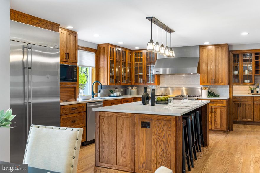 **Offer Deadline Sunday 4/27, 6PM** Welcome to this beautifully maintained 4-bedroom, 2.5-bath colonial, perfectly situated on a spacious corner lot in sought-after Laurel. This stunning home offers timeless curb appeal, modern upgrades, and exceptional outdoor and indoor living spaces. Step inside to find a bright and inviting layout, featuring two generously sized rooms, one with an effortless flow into the heart of the home and one with a cozy fireplace. This impressive gourmet kitchen is equipped with quartz countertops, Viking commercial range, GE Monogram refrigerator, huge center island, and a butler’s pantry perfect for entertaining. A convenient slider opens to a deck joined to the wrap-around side porch and lower level patio with a fully fenced backyard, offering privacy and room to play, garden, or host summer BBQs. Upstairs, you’ll find four generous bedrooms, including a serene primary suite with ample closet space and a beautifully appointed en-suite bath. The fully finished basement provides versatile space for a home gym, playroom, or media room. Conveniently located to all major commuter routes, this home is one you will not want to miss!