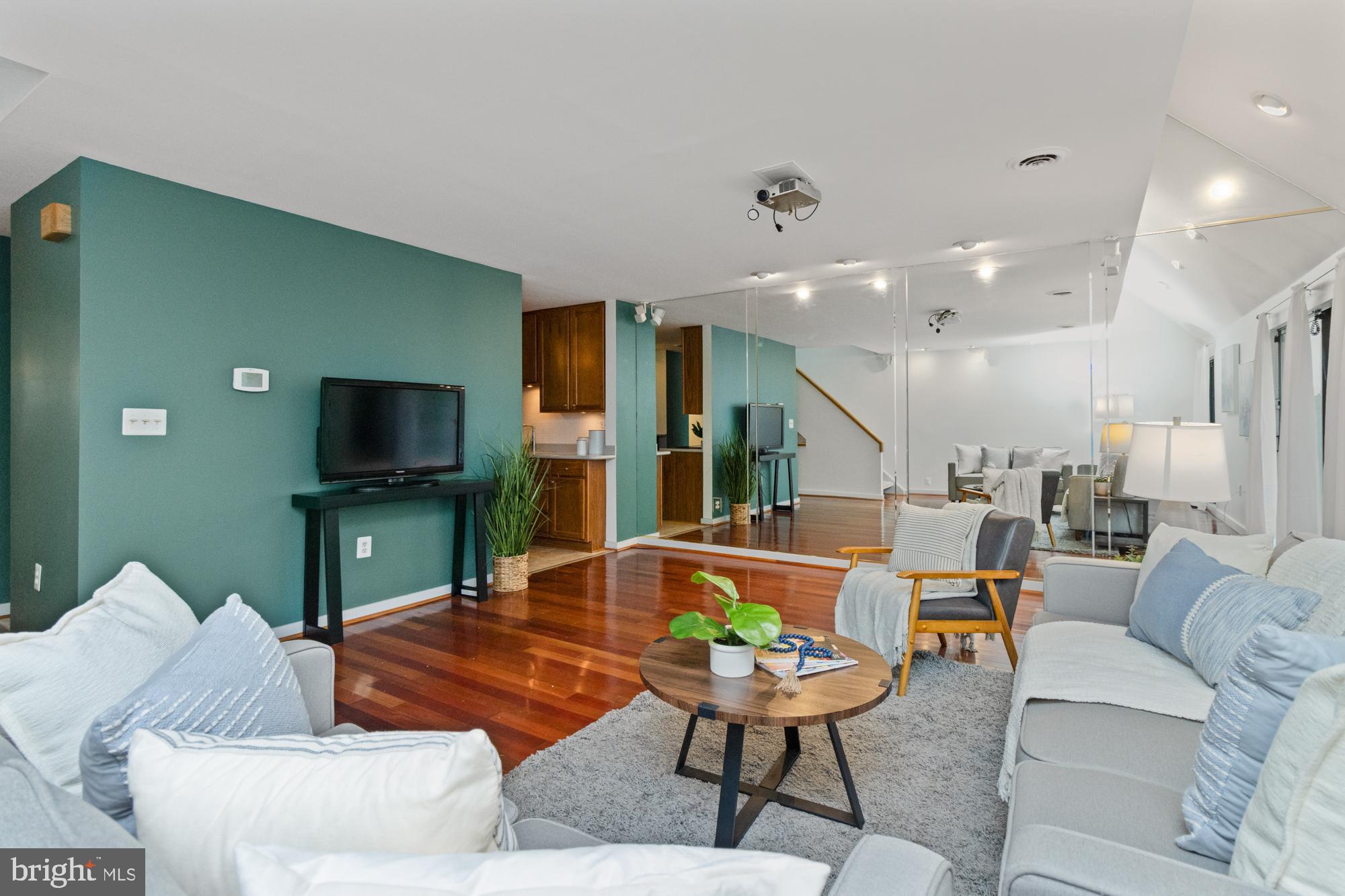 Welcome to one of the largest residences in the highly desirable Coldspring Newtown Condominium community, offering a unique blend of style, space, and convenience. Designed by world-renowned architect Moshe Safdie, this “deck house” style home stands out for its striking modern architecture and walkable, park-like setting. This spacious 3-bedroom, 2.5-bath home has been beautifully updated and is filled with natural light from its oversized windows. Brand new hardwood floors that extend through the living and dining areas, creating a warm and inviting flow. Charming brick patio off of living room to fully fenced yard.
The thoughtfully updated eat-in kitchen features Corian countertops, stainless steel appliances, peninsula, breakfast nook, and a dry bar—ideal for the chef in the family and perfect for gatherings. Much larger than most kitchen designs in the community. Half bath on the entry level.
Upper level includes a primary suite with an en-suite bath and walk-in closet. Cherry floors run throughout the upper level, adding timeless style. Two additional spacious bedrooms and hall bath complete the upper level.
The lower level provides direct access to covered TWO CAR parking, a laundry room, and additional storage.
Coldspring Newtown takes the stress out of homeownership—the condo fee covers roof, exterior, water, sewer, trash, pool access, grounds maintenance, porter service, snow removal, landscaping, and more. Residents also enjoy lush green spaces, playgrounds, and winding walking paths throughout the community.
This is a rare opportunity to own one of the largest and most desirable units in Coldspring Newtown—move right in and experience modern design, low-maintenance living, and a vibrant community lifestyle.
