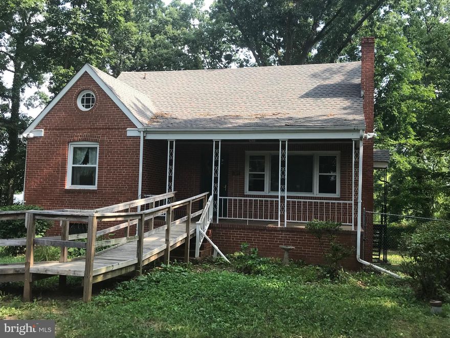Large, solid brick Cap Cod offered by original owner.  Property sold AS IS.   Structure appears to be in great condition, but kitchen, baths, and 2nd floor need renovations.  Roof and windows replaced approximately 5 years ago.  Huge basement with high ceiling could be easily finished.    Please note:  property has public sewer and private well; propane used for cooking.   Huge lot in somewhat secluded area.  Seller reserves right to reject any offer.