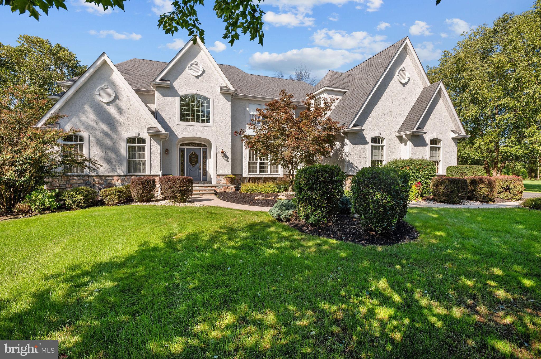 This home is old world class and style coupled with modern amenities. The elegance, comfort, and functional design of 34 Hampshire Dr. makes this two-story luxury French manor home a perfect match for any family. The home was custom built by the owners. The builder/owners orchestrated every detail of each room during the construction of this house. This home has numerous construction upgrades, along with finishing touches not found by any local nor national builders. It is located in the desirable West Wynd development. West Wynd is nestled in the countryside of Northampton Township, Bucks County. This home was built on a 1.75-acre lot on a private cul-de-sac. Imagine living in a prestigious European Estate, with spectacular sun-drenched, two-story rooms, 9' ceilings and coupled with high end kitchen appliances. A multi-level TimberTech deck overlooks the private rear yard setting. This home features 5,663 square feet. The two-story family room was designed with a custom full-walled palladium window. The builder/owners used Pella windows throughout this home. Some of the home's features is a main level in-law's suite which can also be used as a home office and/or child's play area. This room has a full bathroom. The basement is a walk- out and is partially finished with full bath, bonus room, and large entertainment area. A list of amenities is available upon request. Inspect this house, buy this house and make it your home!