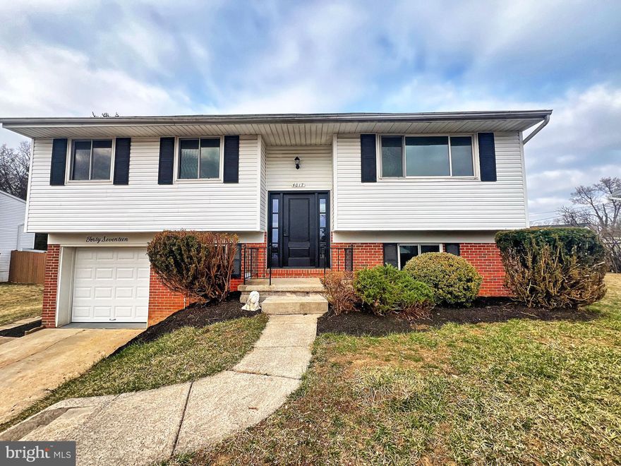 Beautifully renovated from top-to-bottom 4 brm 3 full baths home. Featuring open and bright floorplan. Gleaming, new floors throughout.  New kitchen w/ SS appliances. New baths w/ masterful tile work. Fully finished basement w / club room, bedroom, and a full bath. Nice, flat yard. MUST SEE!
