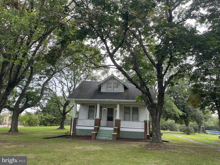 Cute 2 bedroom 1 bath bungalow with hardwood floors on one acre. Front porch and rear enclosed porch. Outdoor shed for storage. Lots of room for indoor storage in walkup attic and full basement. Conveniently located  near shopping and Mary Washington College graduate school, commuter parking lot, VRE, and only 3.5 miles to I-95. Ceiling fan in Living Room. Washer & Dryer "as is". AC is window unit.