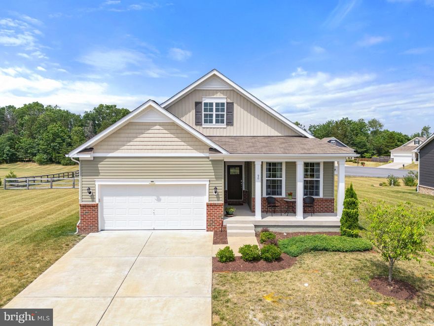 This charming home sits in The Highlands at Blue Ridge Shadows, an active adult community for residents 55+. This three bedroom, two bath modern rancher is the epitome of comfortable, stylish living, all while being low maintenance. Your main level floor plan gives you easy access to rooms against a backdrop of pleasing colors and popular, plank-inspired flooring. Especially nice is how the kitchen, dining and living spaces flow seamlessly from one to the other. The spacious kitchen gleams with white cabinetry, granite counters and casual dine-in seating at the matching island. The more formal dining area is defined with sophisticated wall molding. Glass doors lead to a screened-in porch, offering outdoor dining or relaxation options. There’s also a pleasing primary bedroom with en suite bath and walk-in closet, the two other
bedrooms (which can be used as an office, library, craft room, etc.), the second full bath, and the laundry facilities. Downstairs, the unfinished space holds nothing but possibilities—customize to your lifestyle and needs. A covered porch out front has enough space for seating, and the home comes with an attached two-car garage. This small, quiet community benefits from several amenities, from the Blue Ridge Shadows Golf Club next door to shopping at nearby Riverton Commons to many regional destinations. The neighboring golf course includes walking trails, scenic ponds, and a clubhouse (featuring a restaurant, bar, and outdoor patio). Golf enthusiasts will appreciate the 18-hole course featuring a unique and
challenging layout as well as a driving range, all surrounded by beautiful mountain views.