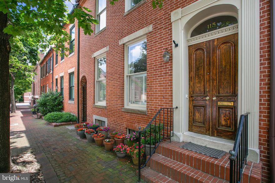 New to market and open Sunday!  Meticulously maintained offering in a prime downtown spot in beautiful historic Otterbein.  115 W. Barre is one of the more grand neighborhood homes, 19 ft wide and on a deep and beautifully landscaped private lot.  The home features 4 bedrooms along with a 5th bedroom/office option and 3.5 baths.   Historic double doors welcome you into a gracious foyer with a beautiful stairwell. The grand foyer opens onto a beautiful living room with wood burning fireplace and original pocket doors leading to the formal dining room.  Imagine family gatherings in this spacious dining room with direct access to one of the prettiest side and rear yards in all of downtown.  The main level enjoys a large kitchen with double sink, stainless appliances, breakfast peninsula and a prep/sink work area.  Just beyond is a powder room and lovely family room/den with sliding doors onto the private patio oasis!  The second level features a recently renovated primary bedroom suite (3 windows wide!) with hardwood floors, a walk-in closet and beautiful en suite bath.  There are 2 more nicely proportioned bedrooms and 2 additional bathrooms on this level, as well as a laundry center in the rear hallway.  The finished upper level is unique with a landing/sitting area, a bedroom and an office/5th bedroom option.  A large unfinished basement provides for all your storage needs.  The home is centrally located near several area pocket parks and is a quick stroll to the MARC train, I-395, Camden yards, the Inner Harbor and all the shops and restaurants Federal Hill and downtown Baltimore offer.