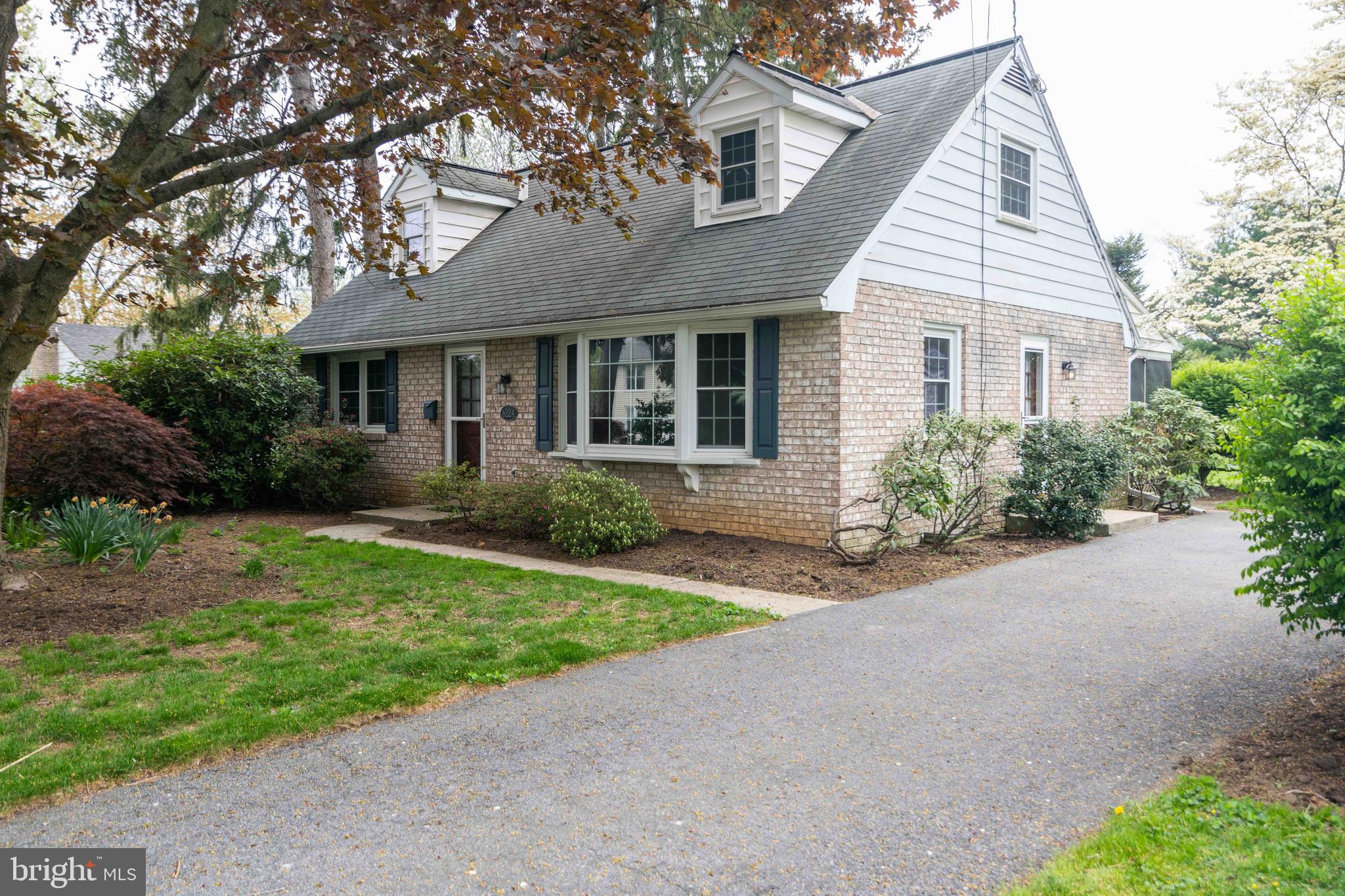 Hometowne Community of East Petersburg is the location of this solid Cape with a brick exterior and functional interior for one floor living with two bedrooms and full bath on the main floor.
Spacious living room with beautiful bay window, hardwood floors and Kitchen/Dining area divided only by a countertop peninsula. Solid cabinetry, the appliances all stay. Off the dining area with slider doors is a screened deck measuring 13' x 23' with a skylight and recessed lighting and a full size picnic table. The screened deck overlooks the back yard and the shrubs offer seclusion that creates your own sanctuary of outdoor living.
Considered 3 bed, 1/1 bath, there is room to expand the attic to a 4th bedroom or continue to use as storage. One of the main floor bedrooms has a stackable washer and dryer that stays. Family room in basement, work shop and utility area with bilco doors for added convenience. Original laundry area in the basement has a washer and dryer.
With cosmetic work, you'll have quite a gem. This house sets back from the quiet street accommodates several cars in the driveway. It is ready for a new owner to create new memories.