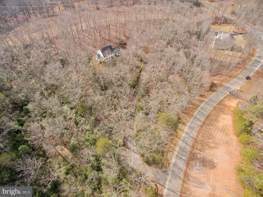 Incredible opportunity Secluded on 4.22 Acres. Serene AND Impressive. Simply IMPECCABLE  Shows like a model  UPDATED thru and thru including:  Kitchen, ALL NEW Baths, NEW Hardwood flrs, NEW Dual Zone Heating/AC Systems, NEW h20 Heater, Upgrades Abound! Stunning MBA Spa.  Luxury Dining Room ready for Celebrations. Lower Lvl Walk Out. NATURAL Gas! MUST OPEN  TOUR LINK HERE!!! - see today