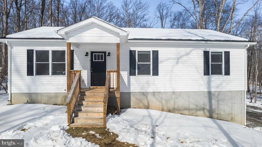 Better than new! This 2022 built home has recently been refreshed from top to bottom with custom updates! 4 Bedrooms, 2 Full Baths (with 3rd rough-in to add to your liking). Beautiful LVP flooring through all the main areas of both levels of the home. Vaulted Ceilings, Custom woodwork + Electric Fireplace w/ mantle, and new paint throughout the entire home. Large open family room flowing into the dining area and beautiful kitchen with backsplash, farm sink and new stove. Off the kitchen is a spacious deck with wide steps to your private backyard ( No Hoa!). Primary Suite offers a ceiling fan and private bathroom with double sinks and walk-in shower. The 2 additional bedrooms on this level are nicely sized and each have ceiling fans.  The lower walkout level features a second family room, 4th bedroom, 3rd rough-in bathroom, and laundry/utilities/ storage space. Also 1 car attached finished garage. Ample parking, Great location- All paved roads. High speed internet. Pics will be uploaded 2/4. Showings start 2/6!!  This one you don’t want to miss!