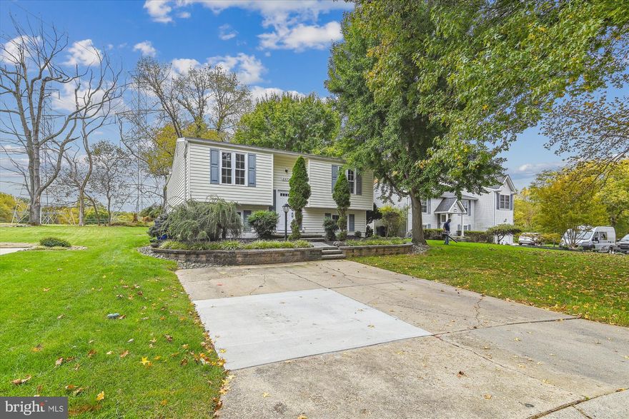 Welcome to this inviting 4-bedroom split foyer home, nestled in a peaceful cul-de-sac. This well-maintained residence boasts modern amenities and a thoughtful layout. A rear addition seamlessly connects to a screened porch, opening onto a spacious deck for outdoor gatherings. The updated kitchen features granite countertops, a central island, and stainless steel appliances. The master bedroom offers a private bathroom with a dual sink vanity and a relaxing Jacuzzi tub. The fully finished basement has a walk-out rear door for convenient access. The charming backyard is perfect for outdoor activities and gardening. The entire house has been freshly painted. Conveniently located near shopping, restaurants, and entertainment, and with easy access to I-95, US-29, and MD-100. Don't miss the chance to make this lovely home yours