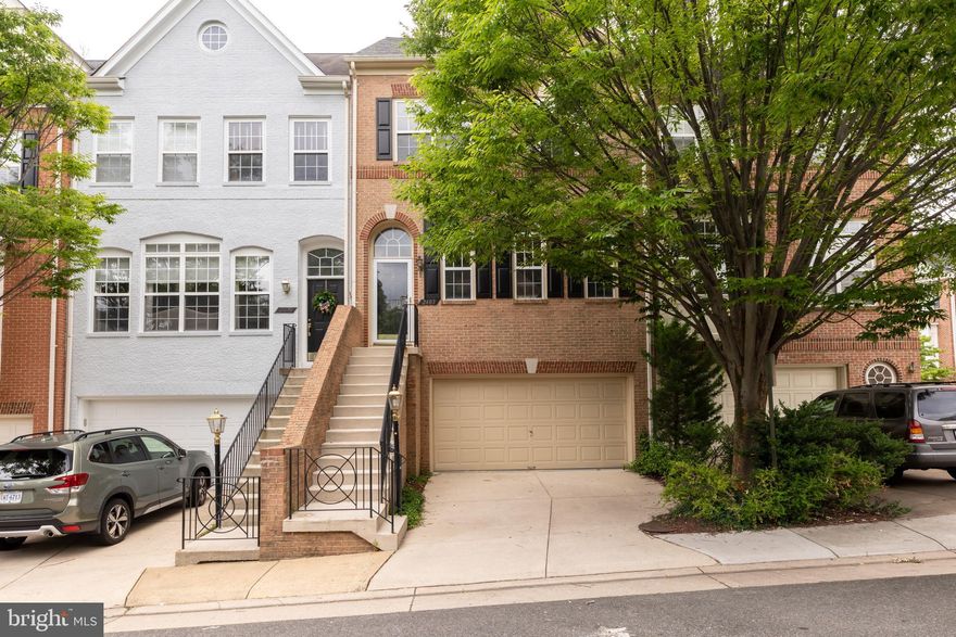 Spacious 4 bedroom 3.5 bath townhouse in the sought after Stonegate community of Alexandria. The main level features a light-filled open floor plan, living room with new carpet, kitchen with center island, cooktop and double wall ovens.  The kitchen includes a breakfast area is adjacent to the family room and opens to a private balcony. The upper level has 3 bedrooms, all with new carpet.  The master bedroom has a vaulted ceiling, walk-in closet and spacious bath. The lower level includes the 4th bedroom with full bath, recreation room with gas fireplace and opens to patio. Stonegate is conveniently located near 395 for easy access downtown. New cooktop to be installed Thursday 7/23.