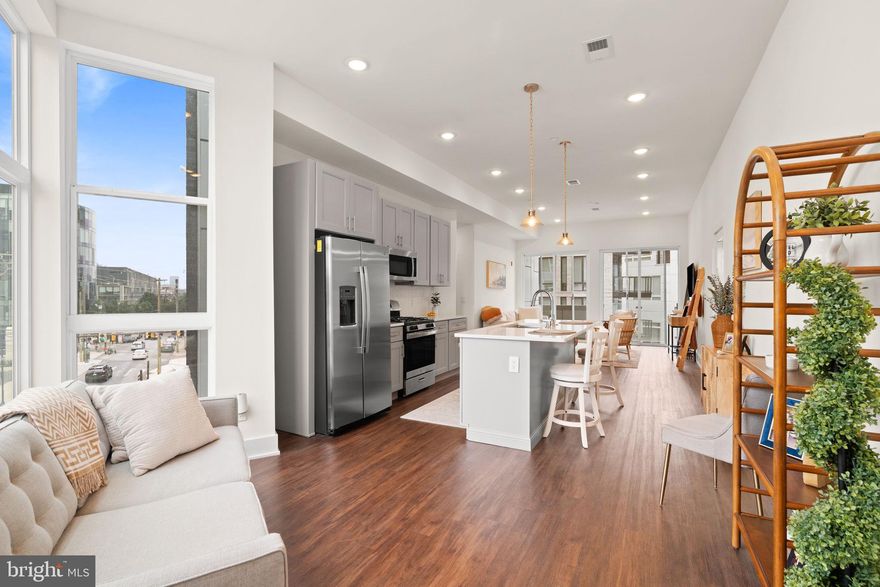 Welcome to 1102 N 2nd Street! This stunning new construction condominium is located in the heart of Northern Liberties, one of Philadelphia's most desirable and dynamic neighborhoods. As you step inside, be greeted by an abundance of natural light pouring in through the floor-to-ceiling windows, illuminating the expansive open-concept layout. With a combined living and dining space, the kitchen serves as the centerpiece. This chefs kitchen features stainless-steel appliances, sleek quartz countertops, subway tile backsplash, 4 burner gas stove, ample soft-close cabinets for storage and is complete with a spacious island with room for barstool seating. Whether you're hosting a dinner party or enjoying a quiet evening in, the seamless flow between the dining and living areas creates an inviting atmosphere for entertaining or relaxation. Off of the living room, you can gain access to the balcony that overlooks all that 2nd street has to offer.  This condominium includes three bedrooms, each offering plenty of space & abundant closet storage. The primary suite is complete with a private balcony where you can savor your morning coffee, a spacious walk-in closet, and an en suite bathroom boasting a large stall shower and double vanities. Indulge in the convenience of residing in the same building as the exclusive two-level community fitness center. Located right off of 2nd Street, your condo is not only steps from some of the most popular bars and restaurants that Northern Liberties such as Figo, El Camino, Urban Village Brewing Company, One Shot Coffee, Standard Tap - but right across the street from Acme, Wine & Spirits, Solidcore, Heirloom GIANT market and so much more! Schedule your showing today!