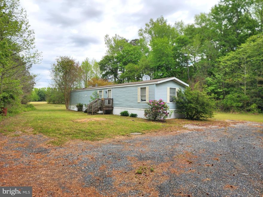 3BR, 2BA Singlewide in need of rehab. Includes two parcels (26 & 46) for a total of 3.10+/- acres.