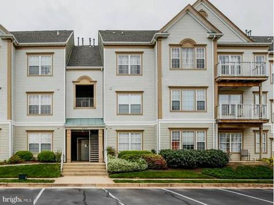 SPACIOUS, BRIGHT & OPEN condo on 2nd floor. Beautiful East-facing corner unit w/ 1249 sq ft ALL on 1 level! 2 Masters & 2 Full Baths; Jacuzzi tub; HUGE closet space;Updated Appliances;Built-in Flat Screen TV above Gas Fireplace CONVEYS! Neutral paint, plush carpeting, Hunter Douglas wood blinds throughout & private covered deck; GREAT LOCATION! Close to shopping, Rt-28 & Rt-7 & Dulles Town Center