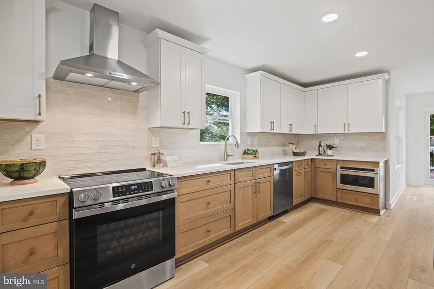 Welcome home to completely renovated 529 Tayman Drive, an impeccably renovated residence blending modern luxury with prime Hillsmere convenience. Situated on a large/spacious, fenced-in corner lot, this 3-bedroom 2.5-bathroom with a finished basement offers a lifestyle of comfort and ease.
Step inside and be captivated by the two-story vaulted living room, a sun-drenched space designed for both relaxation and grand entertaining. The gourmet kitchen is a chef’s dream, featuring sleek quartz countertops and all-new appliances. The primary bedroom is a true retreat, offering a spa-like en-suite bathroom for ultimate relaxation. The finished basement provides ample flexible space for a media room, home gym, or play area. With no detail overlooked, this home is entirely move-in ready. Upgrades include a new roof, new siding, a new composite deck and porch, a new HVAC system, a new water heater, and a new French drain waterproofing system. The backyard has a pour concrete pad with electrical service for a large shed or hot tub! As if the home itself weren't enough, the location is unbeatable—just one block from the Key School and a short walk from the community beach. Discover the best of Hillsmere living.