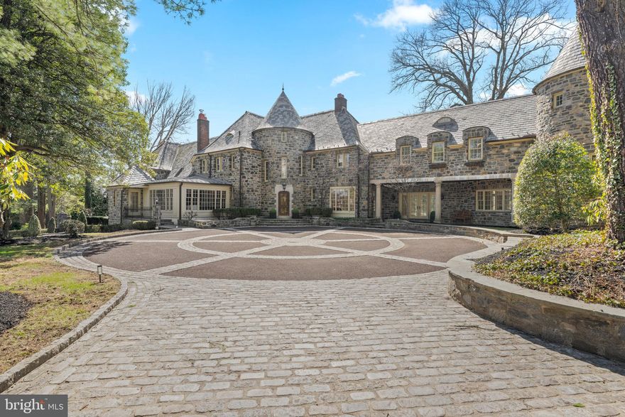 Welcome to 770 & 768 Parkes Run Lane, Villanova, also known as “Arborview”, nestled in the heart of Radnor Township. Within minutes of the Ardrossan Estate, this unique property offers a truly serene setting surrounded by lush, mature landscaping. The 2.6 acre lot (combined) provides total privacy within close proximity to all the conveniences of both downtown Wayne and Bryn Mawr. Through the gated entrance and up the long driveway, you see the exquisite all stone house featuring slate and copper roofs, extensive custom stone work, and a heated in-ground pool. Upon entering the gracious front door, you are welcomed in to the main foyer of the home. Straight ahead is your large formal dining room, with a wall of windows capturing views of the pool and stunning back patio. This room is perfect for all of your entertaining needs. Down the hallway you will find the gourmet kitchen featuring Sub-zero and Viking appliances and double thick quartz countertops. The eat in kitchen features custom built-ins and gorgeous views of the grounds to be enjoyed on a daily basis. Adjacent to the kitchen is a large family room and rear entrance with mudroom.   There is a wet bar in between the kitchen and family room for your entertaining convenience.  Also accessible from the kitchen is a finished lower level. Walk down the sun filled hallway to a large formal living room with a vaulted ceiling. This room features a custom limestone fireplace as well as an attached butler’s pantry for your entertaining needs. The rest of the first floor is completed with a laundry room, two powder rooms and a four-car garage. The second floor has 4 ensuite bedrooms and one set of Jack & Jill rooms. The luxurious primary suite offers a true retreat, featuring a gas fireplace, sitting room, patio, custom Lutron blackout shades, and a new custom designed walk-in closet. The large primary his and hers bathroom features Marble tile, radiant heat, and seamless shower doors. There is also a second laundry on this level, an office area, and family den as well as 3 additional bedrooms with private full baths and a 4/5 bedroom with shared full bath. The third floor features and additional bedroom and bath, perfect for an au-pair or in-law suite. Next to the house sits the amazing guest house which was built in 2012 by the previous owner.  The house features a bedroom, full bath, kitchenette and a regulation basketball half court. This house is perfect for every day enjoyment as well as hosting friends and family. Behind the guest house, down the lane, is a private entrance to the Radnor Trail for your enjoyment. With its rare combination of architectural integrity, modern functionality, and close proximity to everything the Main Line has to offer, this home presents an opportunity that rarely comes along! It is truly a must-see property. There is no sale sign on the property. Pictures of house and property will be published on March 21st.