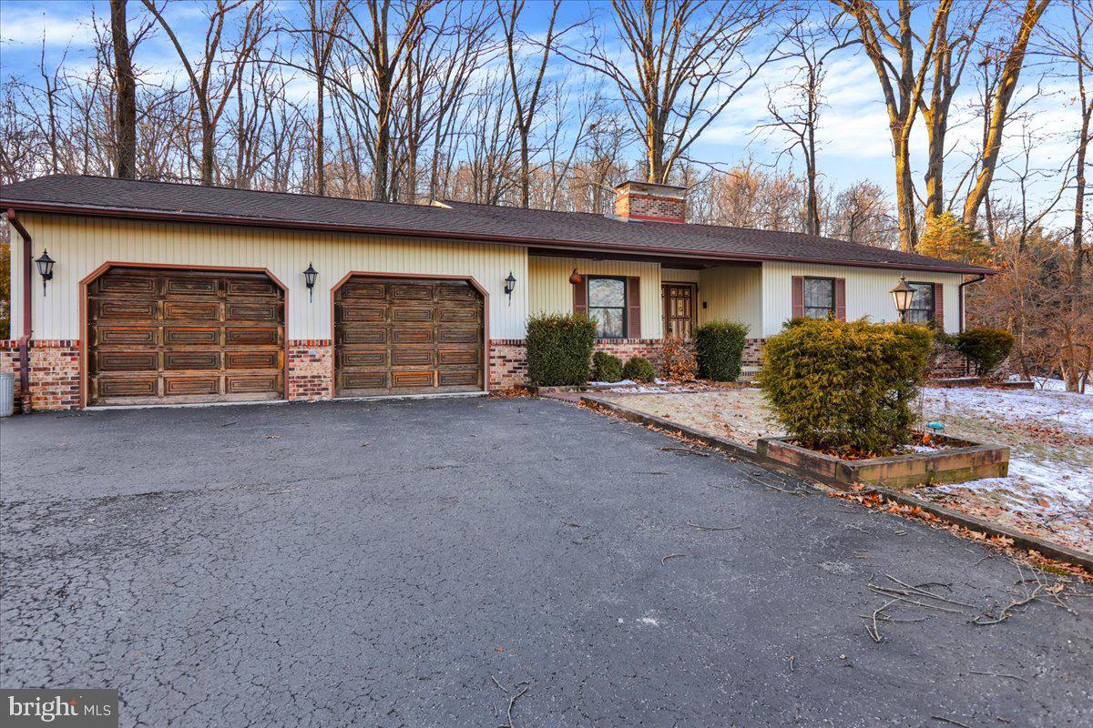 Welcome to 617 Seidels Run!! This lovely ranch home nestled on 2.04 scenic acres offering peace and tranquility. With a thoughtful layout this home boasts 3 bedrooms, two full and one half baths on the main floor. Located in the Schuylkill Valley School District this home is perfect for comfort and entertaining. Enter through the double front doors onto the flagstone foyer and enjoy lots of natural light and two skylights. The enjoyable kitchen with beautiful granite counters, ample custom cabinetry and breakfast room with the adjacent laundry area. Both living room and dining room offer sliding glass doors that leads to a deck that overlooks the serene backyard. The living room with stunning stone fireplace, abundant of natural light, recessed lighting and long-distance views. Enjoy the peace of nature with the expansive deck and open yard, ideal for relaxation or outdoor activities. Primary suite features walk-in closet, private full bath, and sliding door to deck. Two additional bedrooms with full bathroom and powder room for guests. The lower level boasts a spacious family room with brick fireplace and versatile space ideal for a man cave, playroom, office, or extra bedroom, and another full bath, perfect for gatherings or additional living space. There’s a Bilco door for your convenience. This home is conveniently located just minutes from route 183, 61, 222, shops and restaurants. Don’t miss this incredible home! Schedule a showing today!