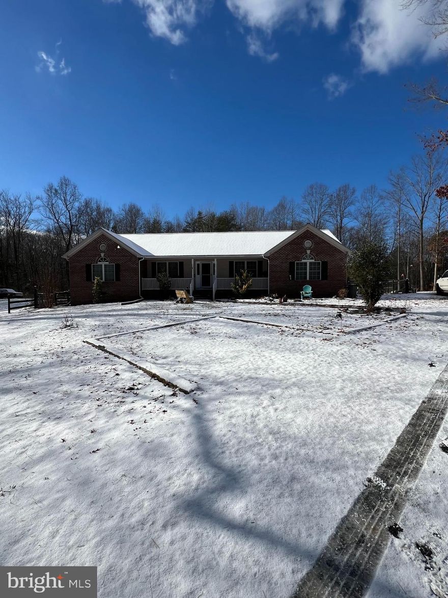 Awesome opportunity!  Horse lover's you can bring your horse, offers two stall stable with water and electric! Large Rear Deck for Entertaining! Covered front Porch for relaxing! Spacious Open Floor Plan! Split Bedroom Design! Vaulted Ceilings and Hardwood Floors in the Great Room with Stone Front Fireplace! all situated on 3.5 acres, of wooded privacy!  close to RT20, so it's easy access to Orange, Culpeper, and Fredericksburg!