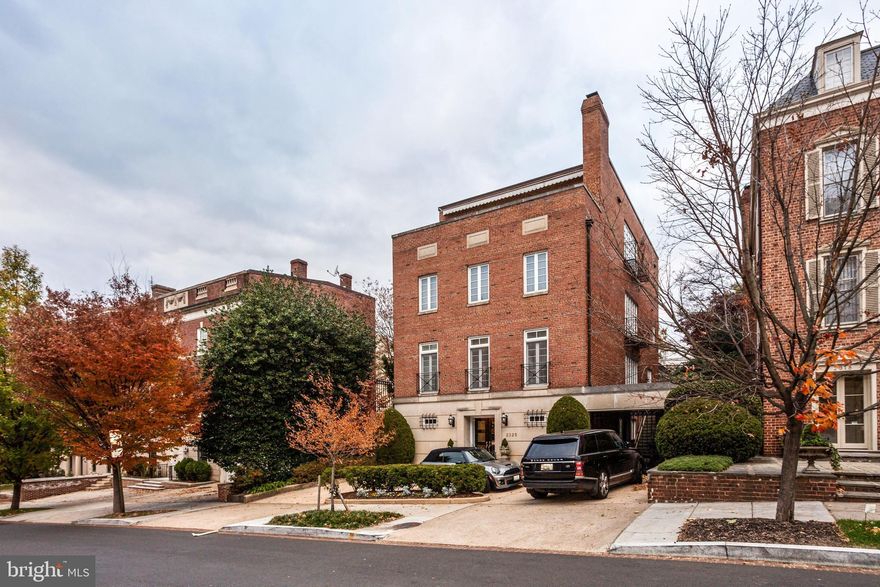Kalorama ranks as one of the finest neighborhoods in America with diplomatic and historic residences that symbolize the role Washington plays in the world. The Textile Museum across the street is just being transformed into a large residence.   2325 S Street is an exquisite gem completely reconfigured and renovated by AlphaTec with no expense spared.  Concrete circular drive with gated parking leads to the elegant entrance with a large Foyer and marble floor.  A 4-level elevator,  staff or guest quarters, full laundry room, guest powder room, climate-controlled 700-bottle wine cellar allow for gracious entertaining.   Polished brass upward spiral stair rail leads to  Living Room with multiple seating areas and grand piano.   A light-filled and spacious DR flows out through full-height windows to private terrace garden for alfresco dining. The gourmet Kitchen has every appliance and convenience plus direct access to the garden. The top two levels contain an enormous family room with media area, game table, and two en-suite bedrooms.  The third level, reserved for the Master Bedroom, includes double bathrooms with gold fixtures and oil-rubbed bronze, and many custom built-ins.  A private roof deck with a remote controlled awning overlooks some of Washington's most memorable architecture.  A real gem, not to be overlooked!