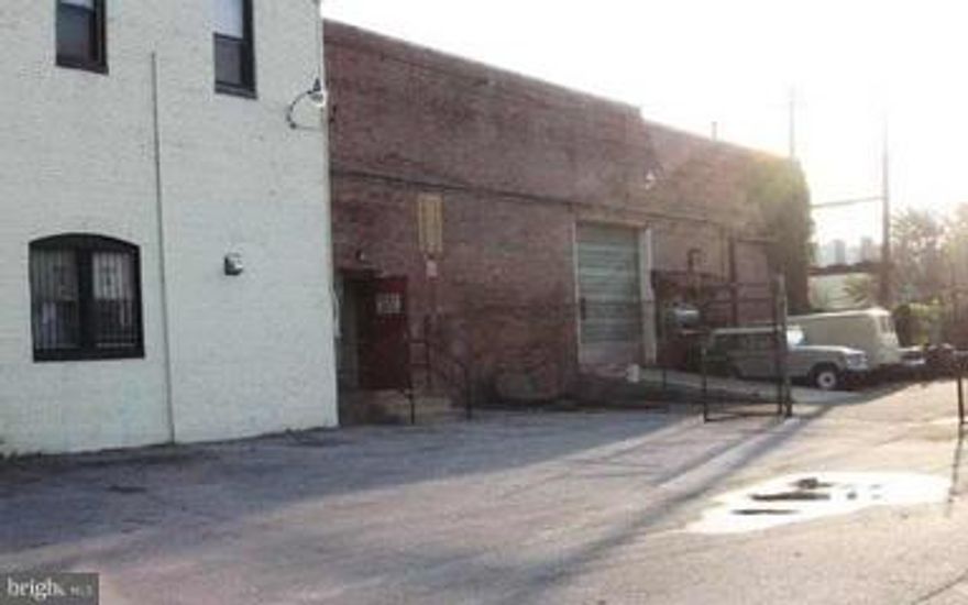 PREVIOUSLY A BODY SHOP. LARGE FENCED PARKING YARD.
