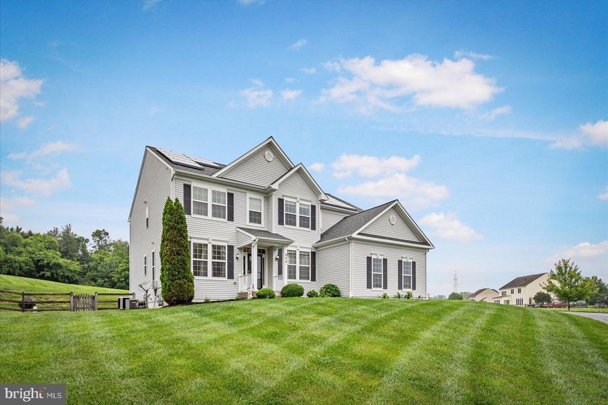 Pristinely maintained and move-in ready 5BR/3.5BA Colonial located  in the rarely available, highly desirable neighborhood of Fieldstone outside of Westminster city limits (no city taxes!).  Step inside a lovely decorated home with over 3200 sqft of living space PLUS a finished basement perfect for the for the growing household. Tons of natural light, light color palette, gleaming hardwood floors, and an open floor plan make this a very inviting home and easy to entertain.  The main floor features a spacious living room, a roomy dining room, a half bath, and a spectacular open concept family room and kitchen.  The family room boasts a two-story ceiling, a gas burning fireplace, and a view of the second floor catwalk.  The kitchen is stunning featuring rich wood cabinets finished with crown moldings, a separate pantry closet, stainless steel appliances including a double wall oven and natural gas cooktop, granite countertops with a tiled backsplash, an island with breakfast seating for two, and room for a breakfast table.  Completing the main floor is a flex space that is perfect for home office or playroom.  From the catwalk on the second floor you can look down over the entire main floor. Upstairs are three spacious bedrooms with a shared full bath featuring a double sink vanity.  The primary bedroom is grand boasting a gorgeous en suite with his and hers vanities, a spacious walk-in shower, a deep soaking tub, and an oversized walk-in closet.  The finished lower level has the 5th bedroom w/egress, a full bath, a large rec room, plenty of storage space, and a walk-out to the amazing yard.  From the main floor step outside to a yard with plenty of entertainment space, green land as far as the eye can see, and a year round yard with flat space for playground, kicking a ball around as well as a great sledding yard in the winter...so many possibilities.  Elevation overlooks the community green space and is a beautiful setting year round, but especially in the fall. On top of all of this, this home has a new roof (2021), new upstairs HVAC (2020), solar panels - owned (2023), laundry room remodel (2022), and new kitchen floor (2023). Yard can be maintenance-free, as sellers have lawn service that mows, trims, and edges for $65/cut! One of the best locations in Westminster, 5 minutes from 140 and downtown Westminster with close proximity to shopping, restaurants, commuter routes, downtown parades and festivals, and lots of area leisure and entertainment.