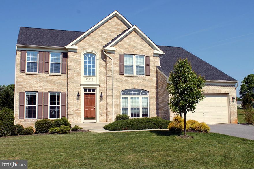 Impressive space with stunning details. Finished basement rec room & game area with half bath. Kitchen includes all appliances, huge island, breakfast room with cathedral ceilings & open floor plan to spacious family room w/gas fireplace. Impressive 2-story entry foyer. Master-Suite includes his/her closets, deluxe tile bath & cathedral ceilings. Hardwd Flrs. Main flr laundry room & 2-car garage.