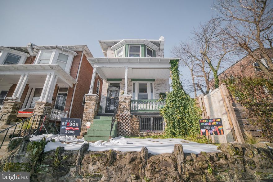 Detached three bedroom, two and a half bathroom home located in West Germantown. Walk up the front yard, up the steps, onto a nice bright front porch.  Enter the home through an enclosed vestibule, into the living room with ornamental fireplace and wainscoting.  Large front window. Walk through to the large dining room and eat in kitchen. Granite countertops and stainless steel appliances. Kitchen island, ample cabinets. Pantry closet, half bathroom, and washer and dryer are located behind the kitchen on the main level.  Nice back yard with the ability to expand it by purchasing the adjacent lot at 343 W Duval, owned by the seller and on the market separately for $75,000. On the second floor there are three bedrooms and two full bathrooms. Central hall bathroom with bathtub. Primary suite has its own private bathroom with bathtub. Huge, dry, basement that is great for storage. Central air conditioning. Ample street parking, eight minute walk (according to Google) to the regional rail at Tulpehocken Station. Just an 11 minute walk to Young American Hard Cider & Tasting Room on Germantown Avenue, where you'll find many other terrific shops and restaurants.