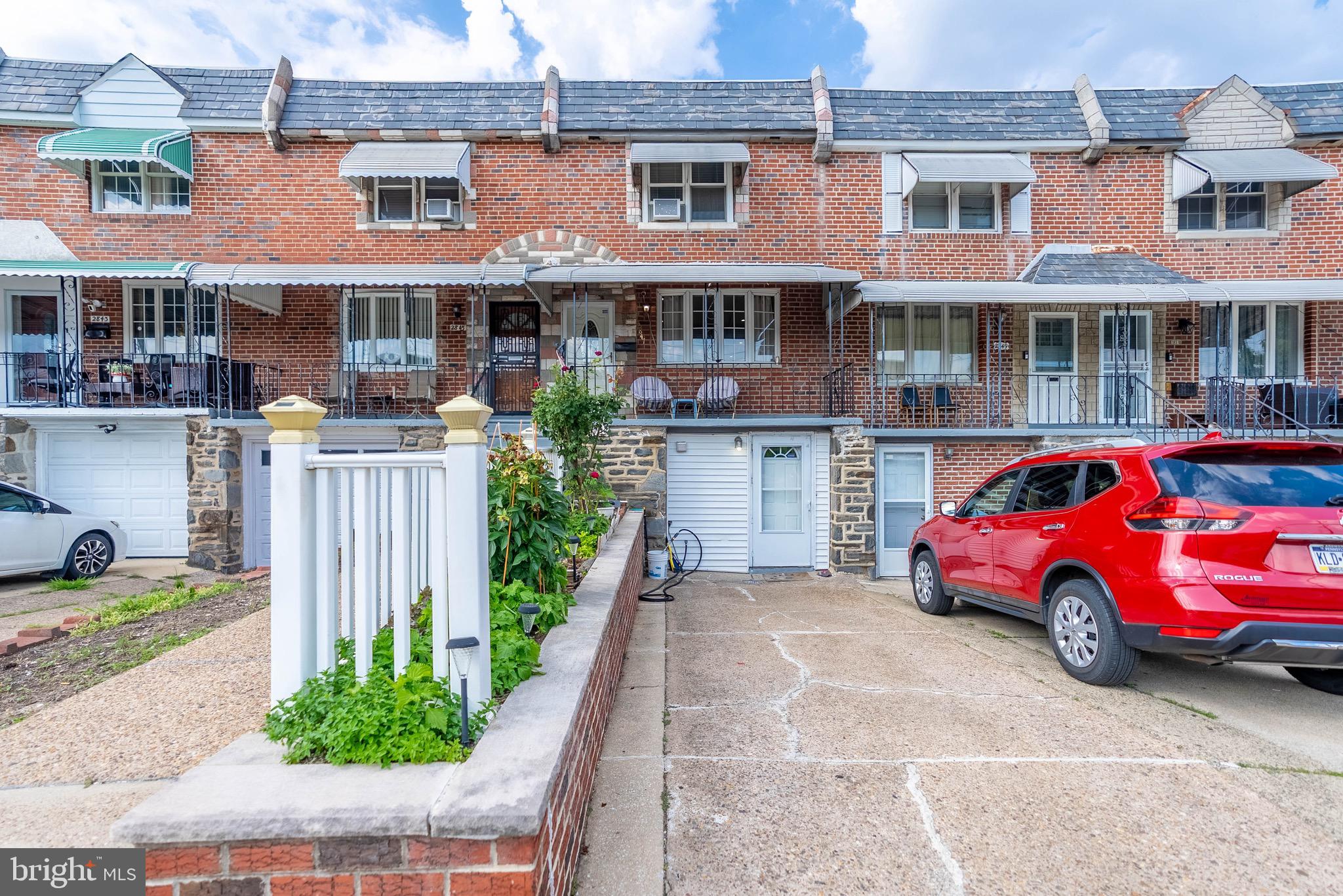 COMING SOON. ACTIVE THIS FRIDAY 6/27/25 | Welcome to Elmwood on the boundary of Southwest Philadelphia. It is my distinguished honor & privilege to present to you 2847 S. 65th St. This 4 bedrooms/ 2 full bathroom house features an extended designated driveway for accessible & convenient parking, along with a front porch with an awning that provides privacy and an open seating area where you can enjoy the beautiful scenery of this vibrant and delightful neighborhood. Open the door into an open living room & dining room with extended windows that brings in illuminating natural light that radiates throughout the house. The hardwood floors bring out natural beauty of the hardwood. The kitchen features an open space & stainless steel appliances. Upstairs are 3 spacious bedrooms and a bathroom. This is a 3 story building where the main floor is on the 2nd level and there is technically no below grade basement. On the ground level from the driveway is a garage door that leads into a lower level that provides additional living space that could be used as a separate apartment or in-law suite. ZONING & USE: This property is zoned RM-1, Residential mixed, which allows for multi-unit dwellings by right. You can legally rent out the 1st floor as a separate apartment since there is a full bathroom with a standup shower & the potential to add a kitchen. Some homeowners in these blocks have converted their garages into additional interior residential square footage by removing the garage partition doors & creating an Open Concept 1st floor level. You could also keep this space for yourself and have a 2nd living space or extension unit where you can place your in-laws or grown children that just won't leave so you can maintain privacy and independence. Other features include laundry hookup, a serene & quiet backyard with gardening where you can spend your summer days grilling and enjoy the functionality of the backyard space, which has an unobstructed alleyway that lead into Passyunk Ave., an industrial & commercial corridor with investments & multi-modal development. This property is well priced and there are strong comparables in the area. This house is located in an emerging neighborhood that borders Passyunk Ave, the intermediary corridor that connects Southwest Philadelphia to South Philly and many important destinations, including Philadelphia's International Airport, sports stadiums, bridges to New Jersey, I-95 to the Delaware River, Bartram's Garden, John Heinz Wildlife refuge, commercial mixed use corridors, and the boundaries of boroughs and townships in Delaware County. Southwest Philadelphia is an area full of vitality, multiculturalism, and diverse residential real estate for any type of buyer. Thank you for your time and we look forward to serving your real estate needs. You can trust that we will ensure a professional and respectful & equitable process for all potential buyers and we look forward to doing business with you.