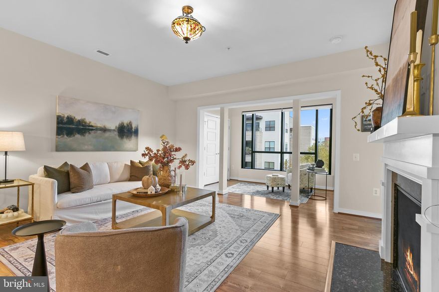 This rarely available Anthem model boasts an elegant living space with a light filled sunroom,  fireplace and gleaming high-end laminate floors. 
The gourmet kitchen has granite counter tops, cherry cabinets and  Whirlpool/KitchenAid appliances and there’s a good size laundry room adjacent. The huge primary suite has plenty of space for a sitting area, a walk-in closet, additional closet, and fabulous spa like bathroom with a double vanity, shower and soaking tub. There’s a large second bedroom and full bathroom.
The unit comes with with a garage,  parking space, and  climate-controlled storage unit
Spring Hill is a gated 55+ Active Adult Living community. The community’s clubhouse offers an indoor swimming pool, an exercise room,  aerobics /yoga room, billiards room, “great room” that can be used for meetings or other activities & a ballroom that can be rented for parties There are also outdoor tennis, pickleball, and bocce courts. There’s even a “Tot Lot” for when the grandkids visit. 
The community has a full activity program, which includes bridge, bunco, mah-jongg, poker; and a general game night and monthly pot luck dinners. 
If that’s not enough to keep you busy Laurel Hill Golf club is right next-door to the community and the Workhouse art center is a six minute drive away. 
Liberty Market, once part of the old Lorton reformatory, is located just outside the community gates and has a Lidl grocery store, restaurants and other small shops.
Great transport links nearby with the I-95 and Amtrak Auto Train about a 6 minute drive away, the Lorton VRE, where you can also catch an Express Bus to NYC, is about 10 minutes away and the Springfield Metro about 20 minutes away. 
This place really does have it all!