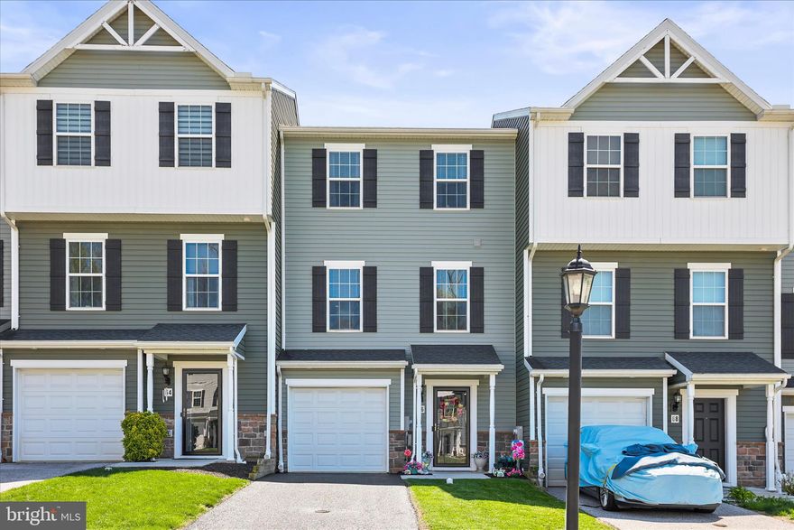 Beautifully maintained 6-year-old, 1700 sq. ft. townhome with a garage, featuring a bright open floor plan and modern finishes throughout. The first two levels offer durable luxury vinyl plank flooring. The kitchen includes plenty of cabinetry and a center island, perfect for cooking and entertaining. This home offers 3  bedrooms, 2½ baths, and a rough-in for an additional bath in the lower level. The beautifully finished walk-out lower level provides extra living space and flexibility. Enjoy outdoor living with a deck off the upper level and a patio below, along with a fully fenced yard.  Plenty of overflow parking nearby and there’s even parking available for your trailer.  The South Hanover location is convenient for Maryland commuters.