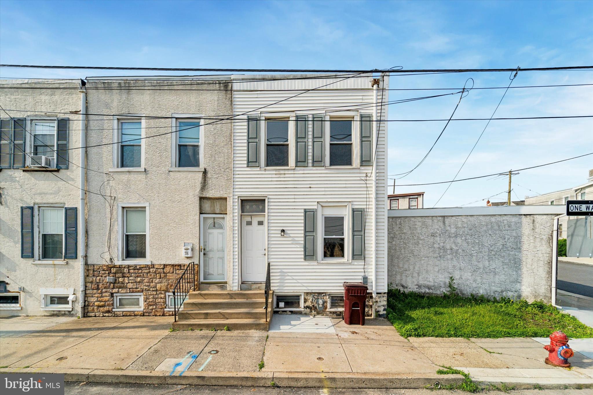 Don't miss this recently renovated and affordable end-of-row townhouse nestled in the heart of Bridgeport’s up-and-coming neighborhood! This move-in ready home boasts modern updates with functional living, making it a fantastic opportunity for a first-time buyer or investor. Step inside to a bright and airy main living room featuring beautiful luxury vinyl plank flooring that flows throughout the home. Continue into the rear eat-in kitchen, where you'll find golden shaker cabinetry, stainless steel appliances, plenty of countertop space, and a table space. Upstairs, two generously sized bedrooms offer large windows, built-in closets, and ceiling fans for comfort. The full bathroom has been tastefully updated with modern tilework and a tub/shower combo. Downstairs, the full unfinished basement houses the laundry area and provides ample storage space or potential for future finishing. From the kitchen, step out to your private, fully fenced-in backyard featuring a covered patio, perfect for year-round use. On-street parking is available right out front. Located just blocks from local restaurants, parks, coffee shops, and other great hotspots in the rapidly growing Bridgeport market. You're also close to the train station for an easy ride into Center City, and just a short drive to the vibrant dining and nightlife scenes in Conshohocken and King of Prussia. Plus, enjoy quick access to the Turnpike.