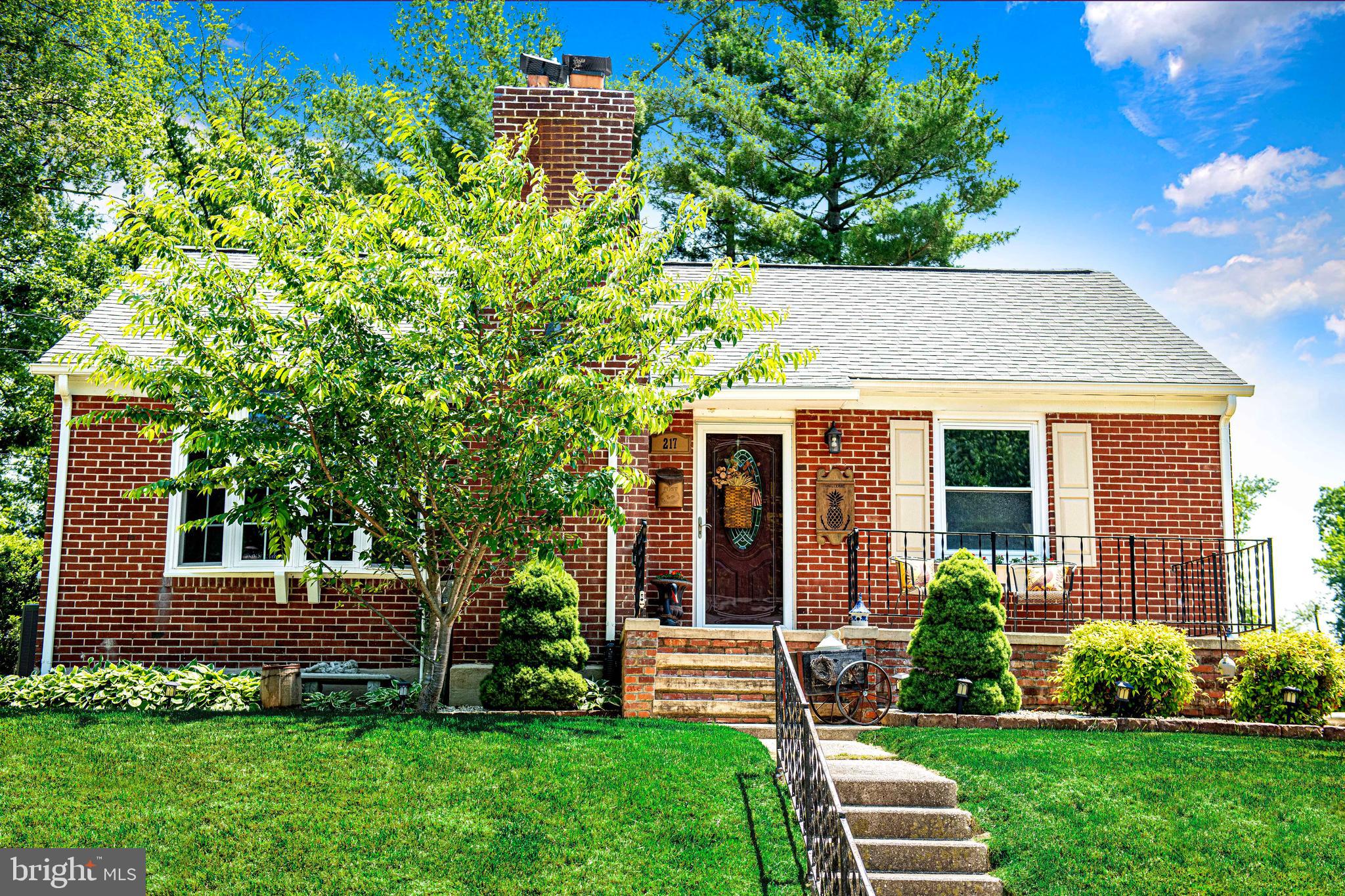 Nestled in the sought-after Paradise Manor neighborhood, this meticulously maintained all-brick rancher offers the perfect blend of classic charm and modern updates. Featuring one-level living, the home includes three bedrooms, with the third bedroom currently being utilized as a formal dining room, and one and a half baths. Rich hardwood floors flow throughout, complementing the living room with a wood-burning fireplace and a new bow window that fills the space with natural light. The kitchen is equipped with sleek granite countertops and a country-style ambiance. Adjacent to the kitchen, the all-season room serves as a cozy family room, providing additional living space. The unfinished basement is a versatile space, featuring an updated half bath, and is fully waterproofed with a lifetime transferable warranty. Recent updates include a new roof, hot water heater, and HVAC system, ensuring peace of mind for years to come. Freshly painted interiors enhance the home's appeal. Outside, the property is equally impressive, with a patio, detached carport, and off-street parking. The beautifully landscaped yard features paver bricks surrounding garden beds filled with crushed marble rocks, mature trees, and garden lighting, creating a serene outdoor retreat. Conveniently located near schools, restaurants, and shopping, this home offers both comfort and convenience.
