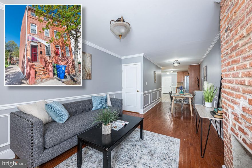 PICTURE PERFECT HOLLINS MARKET RENOVATION WITH THE PERFECT MIX OF MODERN AMENITIES AND HISTORIC CHARM!  Features include 4 levels of finished living space, a spacious living room and dining area with hardwood floors, crown molding, and a decorative fireplace, a large Chef's kitchen with granite counters & ss appliances, a convenient main level half bath, 2nd level with 2 generously sized bedrooms and a full bath, 3rd level Primary suite with a full bath and sitting room which leads to a rear deck, a finished basement with a family room, half bath, and laundry area, and a rear fenced yard.  Conveniently located close to downtown Baltimore, UMMC, stadiums, and major roadways.