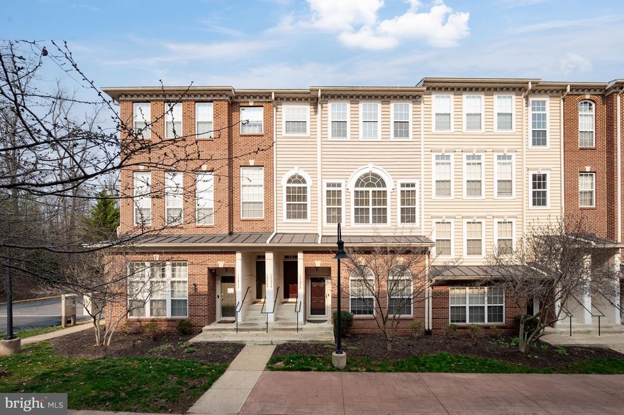 **OPEN HOUSE Sunday, 3/15/2026, Noon to 3PM**
SPACIOUS MOVE-IN READY Property with 4 Bedrooms and 3 Bathrooms. One Car Garage. Open Floor Plan with Gourmet Kitchen. Granite Countertops and SS Appliances. Double GE Profile Oven. Cherry Cabinets. Hardwood Floors. Private Balcony for sipping your Morning Coffee. Over 2300 Square Feet of Living Space. Outdoor Pool, Tot Lot and Picnic Area. Minutes to I-66 and Highway 15. Retail Shopping, Grocery Stores and Restaurants nearby. Dulles Airport is 22 Miles Away. UVA Haymarket Health Medical Center is across the street. Association fees include pool(s), recreation facility, snow removal, common area maintenance, sewer, water, trash. Market Center Condo Community. Main level half bath was converted to full bathroom and living room was converted to fourth bedroom. These modifications are being conveyed as-is and not currently reflected in the tax records.