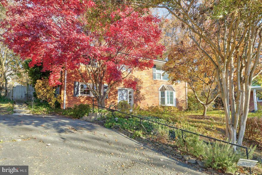 The home is situated at the top of a cul-de-sac and backs up to Fort Scott Park for a private tree-lined backyard. It has been expanded to include a climate-controlled sunroom on the back of the house. The kitchen has been renovated with hard wood cabinets and quartz countertops. The home has hardwood flooring on the main level bedrooms and the dining room. Roof has solar panels which are owned and will result in significantly lower electric bills for the tenants. Great location walkable to nearby Four Mile Run Park and Mt. Vernon Trail as well as retail and grocery stores. The scene from the dining room at night is amazing with the view of Alexandria and planes landing at the airport.  The backyard is very private.  At night the landscape lighting lights up the terrace and with the park in back, it feels like you are miles away from DC.