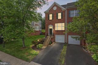 Move in ready now !!! Best value in Prince William County! Move-in ready and ideally located in the heart of Manassas at Townes at Compton Farm, this rarely available brick-front end-unit garage townhome offers over 2,500 sq. ft. across three spacious, light-filled levels with a bump-out design. Features include ample-sized bedrooms, 2 full and 2 half baths, custom plantation shutters, and a cozy gas fireplace. The kitchen and sunroom showcase gleaming hardwood floors and a brand-new kitchen remodel with premium quartz countertops, resurfaced cabinets, a luxury sink, upgraded lighting, and more. Recent updates include a new garage door, French doors (2024), deck (2024), HVAC (2019), hot water heater (2024), refrigerator (2020), dishwasher (2020), and microwave (2020). Additional highlights include ceiling fans in all bedrooms, a large fenced yard backing to open common area, and a finished recreation room with generous storage. Conveniently located near major commuter routes (Prince William Parkway, I-66, I-95, Routes 28 & 29, and VRE) and just minutes from Old Town Manassas with its shops, fine dining, breweries, and wineries.