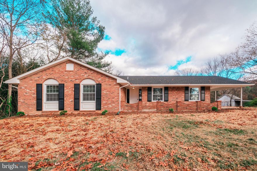 Check out this charming brick rambler located just up the road from downtown Woodstock.  The entire house has been renovated to include: roof, gutters, windows, siding, gourmet kitchen w/ granite countertops, bathrooms, appliances, and Heating/AC.  ALL NEW!! The well was drilled a few weeks ago and is producing 20GPM.  Notable features include:  HIGH SPEED INTERNET, upgraded flooring, energy efficient mini split units, and the list goes on.  Conveniently located and priced to sell...this home won't last long.  A MUST SEE!!!