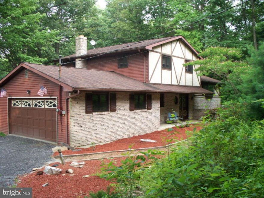 Nature Lovers Dream Property! Spacious custom built 3 bedroom, 2.5 bath home w/ 2car garage.  Beautiful hardwood floors in Living Room & Bedrooms. Family room w/ economical coal insert in fireplace. Freshly painted throughout, newer replacement windows (2002). Foyer 9.6 X 9.3. Finished room in lower level for possible 4th bedroom. Mailing Address Continued: Tamaqua Color: White Amp: 200