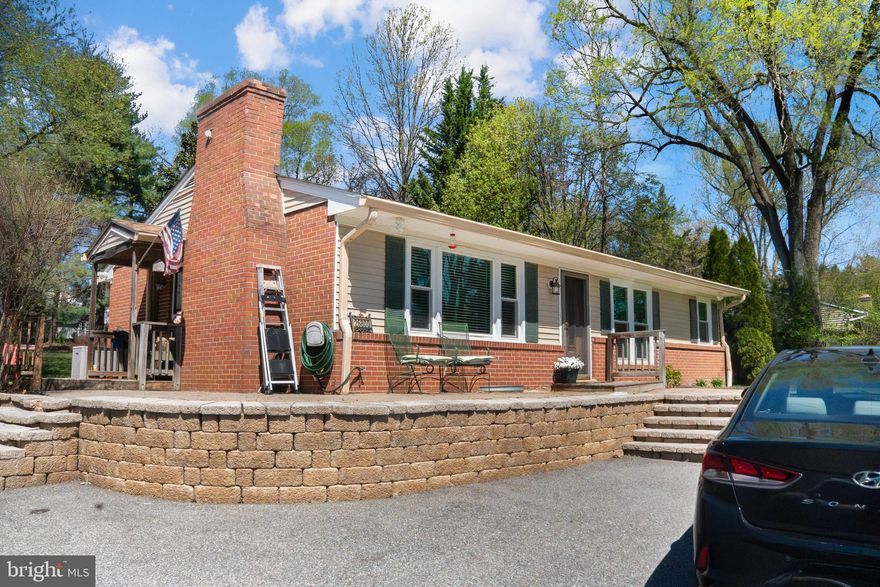 Beautifully maintained all-brick rambler situated on a spacious, private lot in sought-after Damascus offering the perfect blend of comfort, functionality, and outdoor living. The home features a newer roof (approximately 4 years old) and a recently replaced septic system (2015), providing peace of mind for the next owner. This property offers 4 bedrooms and 2 full bathrooms, with 3 bedrooms and 1 full bath on the main level, and an additional bedroom with a full bathroom in the fully finished lower level, ideal for guests, extended family, or added privacy. Inside, you’ll find a bright and inviting layout with durable luxury vinyl plank flooring throughout the lower level, a well-kept kitchen with stainless steel appliances, and flexible living spaces perfect for everyday living, entertaining, or working from home. The finished basement provides a large open area with multiple use options while maintaining a comfortable and functional feel. Step outside to an expansive rear deck overlooking a large, flat backyard surrounded by mature trees, creating a private retreat perfect for gatherings, gardening, or simply relaxing. Conveniently located near shopping, dining, parks, and major commuter routes, with no HOA and plenty of outdoor space, this is a rare opportunity for buyers looking for both space and flexibility in a well-established neighborhood.