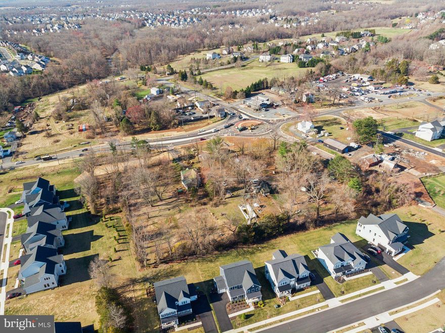 Opportunites!!!  THE ORIGINAL ADDRESS WAS JOHN MOSBY HWY.  Four  acres (4.18 acres)  of land fronting Route 50 and with two entrances, two houses, two wells, two septics, public water now at the property.  Multiple out buildings.  The value is in the land.  ZONING is TR2.  This property is at located at the corner of the new Trailhead roundabout.  The acreage is comprised of two lots to be sold together.  Large lot is 3.62 acres, smaller lot is .56 acres.  Usage is Residential OR Commercial. Check Loudoun County zoning for TR2 uses.