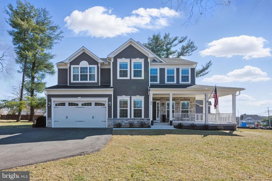 Stunning house recently built in Loudoun County’s wine & horse country! This exceptional home home sits on a scenic 0.57-acre lot in Lovettsville, Virginia, offering breathtaking mountain views from its inviting wraparound porch. Don’t be fooled by the street address, as this home faces Quarter Branch Rd! 

Inside, the grand two-story foyer leads to an open main level with wood floors and designer lighting. The gourmet kitchen boasts stainless steel appliances, a gas cooktop, double ovens, quartz countertops, and a large island. The morning and family rooms, centered around a striking stone fireplace, create the perfect gathering space. Formal living and dining rooms add more places to entertain, while a private home office with a bay window offers a quiet retreat. A stylish mudroom and a full bath complete the main level.

Upstairs, the luxurious primary suite features vaulted ceilings, a walk-in closet with two separate rows for clothing, and great en-suite bath with tons of natural light. The top floor has another four bedrooms, giving this house a rare 5-up bed configuration. A convenient laundry room is also located on the top level. The lower level offers a bright recreation room, a full bath, and two large unfinished spaces for storage or future expansion. All square footage imported directly from the tax records to be verified by buyers.

Located near Lovettsville’s new Coop grocery store, coffee shops, parks, restaurants, and more, this home blends luxury with small-town charm. Also situated just 10 minutes from the MARC train, making commuting to D.C. effortless. With more wineries nearby than one could count, and outdoor adventures at every turn, this location has something fun for everyone.