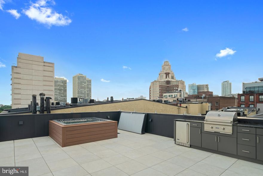 The extra large CORNER home at Lippincott. Truly one of a kind. 25+ side windows drench the floorplan with natural light. 20 foot tall ceilings in the great room. The top floor is a never before see inside/outside room that will make your jaw drop. Private elevator, 10 year tax abatement, 2-car garage, roof deck with plunge pool and more. Every detail was thoroughly planned and implemented starting with renown architect, Atrium Design Group. The corner unit blends perfectly with the street aesthetic but nothing is standard inside. Enter your home right off of 3rd Street or from your private, oversized two car garage with massive ceilings (car lifts could be done here as well) to the first floor featuring a powder room, closet and the direct package drop off for deliveries so nothing is left on your stoop. The private elevator is accessible here as well and will take you all the way up to the roof deck. Ascend to the second floor and you will find a truly special living area. The large dining room is located on the North Wing of the property beyond the stairs, bathroom, and elevator entrance. The South Wing features a HUGE living room with massive 20 foot ceilings, huge kitchen with butlers pantry or wine room and expansive windows. 12 Massive windows flood this floor with Eastern and western sunlight. The Chef's kitchen is decked out with an oversized island and top of the line appliances. Custom cabinetry and quartz countertops are a few of the selections waiting to be made by you. The third floor includes two en-suite bathrooms and a large flex space that could be a library, office or workout space. The MASSIVE master bedroom suite on the 4th floor includes a private office with double glass doors, wet bar, huge bedroom with oversized windows, two enormous walk-in closets with custom cabinetry and a spa-like master shower with freestanding tub. The most unique feature of this home is the transitional indoor/outdoor roof deck. The 5th floor features another spacious living room with an indoor bar, full bathroom and living room. Floor to ceiling sliding doors lead out to a private roof deck with Outdoor kitchen and plunge pool. Here you can enjoy the space 12 months of the year and entertain large groups of friends and family. A normal home is 38 feet tall but with zoning, this home is 60 feet tall which allows for amazing ceiling heights throughout. Don't miss out on your chance to customize this once in a lifetime Philadelphia gem!