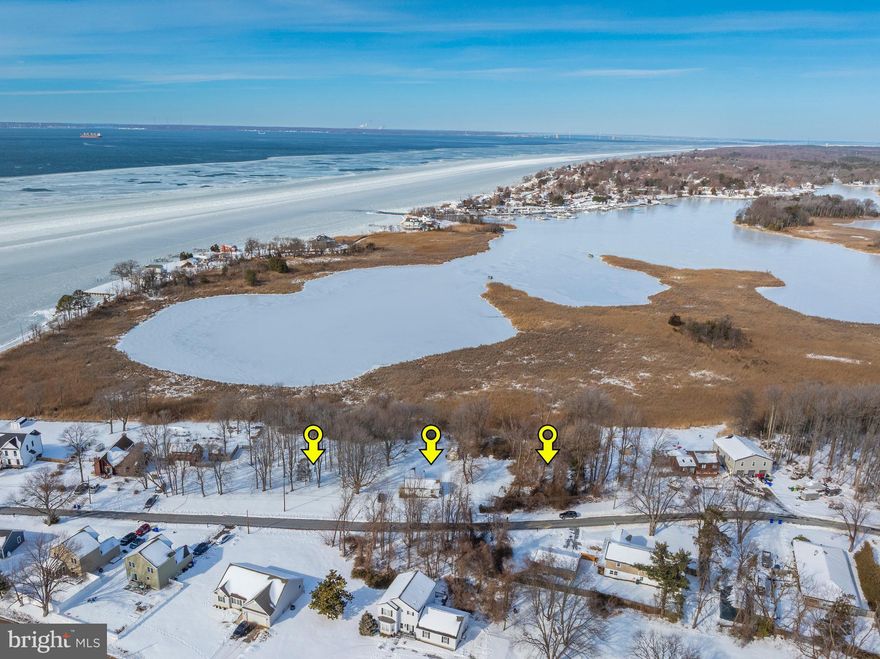 This is a wonderful shaded lot offering  .26 acre and incredible views of Price Creek and the Chesapeake Bay, and a 2 minute walk to the community beach on public sewer.  This is listed and offered individually along with two other adjoining lots listed at $249,000 and $275,000 to make three awesome Kent island building sites in a row. If you walk these lots, you will want them ALL !!