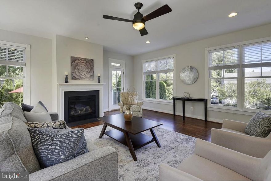 This stunning 5 bedroom/ 5 bath home in the Over Lee Knolls neighborhood is available for rent on 7/5/2024. You will love the gorgeous hardwood floors throughout, recessed lighting,  fireplace, and large windows allowing in an abundance of natural light. The updated, open-concept kitchen has granite countertops, stainless steel appliances, a gas range, and a spacious layout making cooking a joy! A bedroom/office and full bath can be found on the main level as well. The primary bedroom is located on the second level complete with an en-suite bath featuring double vanity, large soaking tub, and glass door enclosed shower. Three additional bedrooms, 2 full bathrooms, and dedicated laundry are also located on the second level. The top floor of the home holds a spacious bonus room, perfect for an additional family room or game room.  A fully finished basement with a full bath completes the interior of the home. Parking will be a breeze with the attached 2-car garage. Beautifully landscaped grounds and a paved patio await you, ready for all your entertaining needs. 2-minute walk to East Falls Church metro, quick access to I-66,  close to shopping, restaurants, WO&D Trail, and so much more! Don't miss out on this beautiful property!