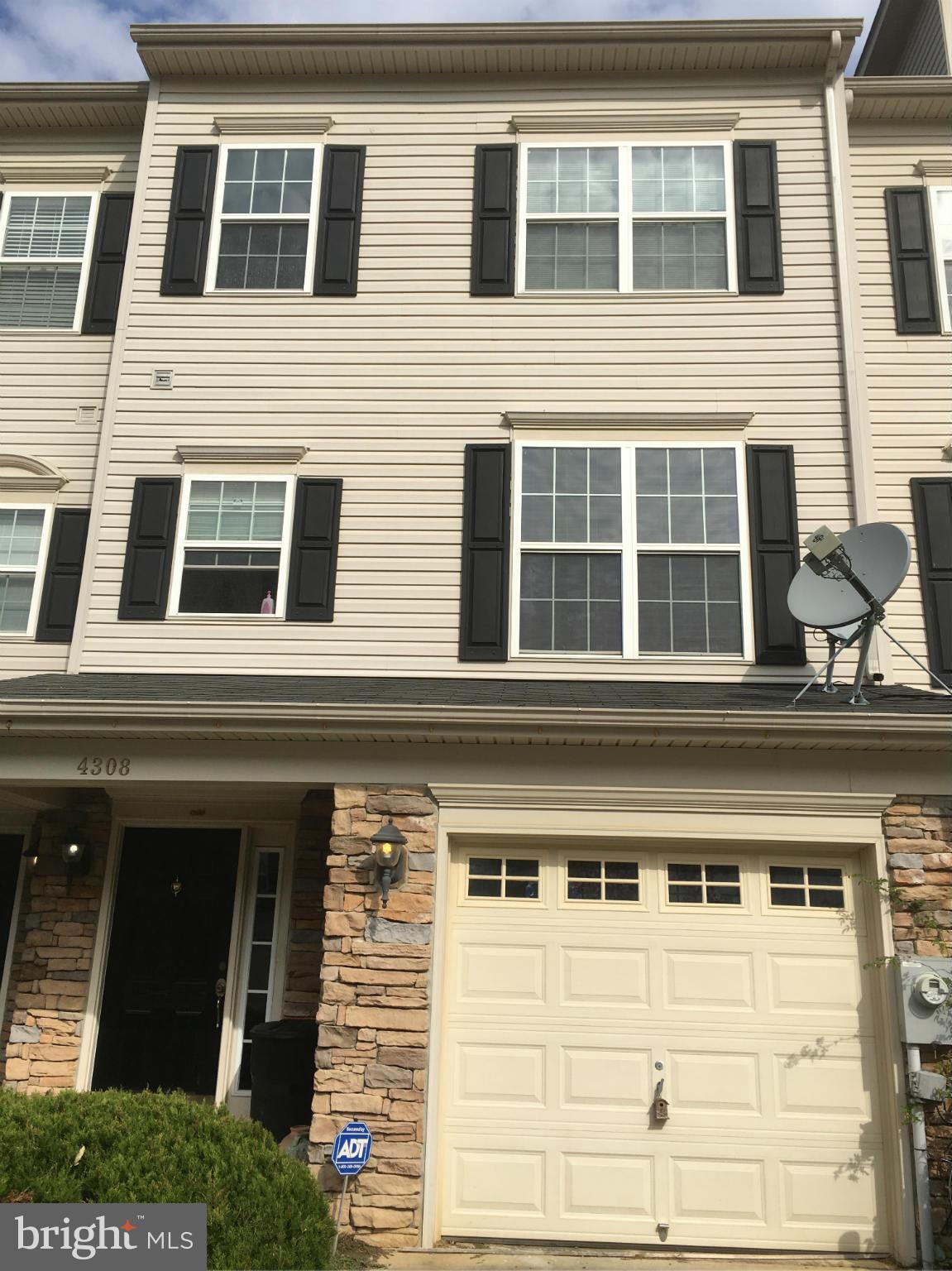 Beautiful garage townhouse with lots of space! Large basement with fireplace and plenty of light. Main level includes a kitchen/eat in area, family room and deck off kitchen for easy outdoor entertaining. Separate formal dining & living room area with great floors and large windows for plenty of natural light. Huge Master w/2 walk-in closets & private bath.