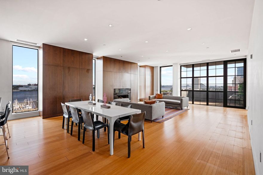 Luxurious 2,556 Sq. Ft. half floor Residence in a premier Philadelphia Boutique Modern Condo Skyscraper with the MOST INCREDIBLE VIEWS! Enter the Residence by stepping off the high-speed Elevators Directly into Your Home and you will immediately see the Breathtaking River Views, wide plank Wood Floors and 10 ft. High Ceilings. The foyer opens Directly into the Huge Light-Filled Living Room, Dining Room and Excellent Customized Kitchen with a Large Terrace highlighted by River, Bridge and City views! This Is the Perfect Space to Entertain Large Gatherings as well as Intimate Dinner Parties. The Chef’s Kitchen Includes a 36″ Viking Gas Range, two Ovens, and a Viking Refrigerator, two Dishwasher drawers, Timeless Custom-Built Cabinets with Stone Countertops and a Pantry. Wine Storage for 400 bottles! Electric Shades! There are three very spacious bedrooms each with their own en- suite stone bathroom. Retreat to the Primary Suite with floor-to-ceiling windows highlighting Sensational views of the Benjamin Franklin Bridge and the Delaware River. The Master bathroom is luxurious and spacious with two sinks, a spa-like soaking tub and an oversized shower with a French drain.  The closet space throughout this home is beyond exceptional!  One covered parking space is included on-site. A True Hidden Gem in Old City in Philadelphia’s Design District with the finest shopping, High End Furniture stores, Award Winning restaurants and coffee shops.