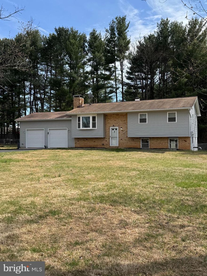 Welcome to 3703 Altondale Rd—this beautifully maintained 3-bedroom, 2 full bath split foyer. This home is perfectly situated on a spacious .5 acre, with a fenced in yard, offering a blend of comfort, functionality, and thoughtful updates throughout.

This inviting home features an updated HVAC system and upgraded electrical, providing peace of mind for years to come. The roof was replaced in 2016 and includes a transferable lifetime warranty—an exceptional benefit for the next owner. A whole-house water filtration system enhances everyday living, while LeafGuard gutters simplify exterior maintenance.

Inside, warm and welcoming living spaces are complemented by two pellet stoves—one in the living room and one in the family room—creating a cozy ambiance during cooler months. The kitchen offers both style and practicality with granite countertops and direct access to the rear deck through sliding glass doors, making it ideal for entertaining or enjoying quiet outdoor moments. The upper level is complete with three comfortable bedrooms and a full bath.

The finished lower level has a large family room and a full bathroom with a stand up shower. The home has also been fully waterproofed.

A two-car garage adds everyday convenience and additional storage.

Conveniently located near Route 91, Route 30, 140 and 795, this home offers the perfect combination of modern updates, energy-efficient features, and inviting spaces—all in a peaceful setting with room to grow. Don’t miss your opportunity to make it yours!