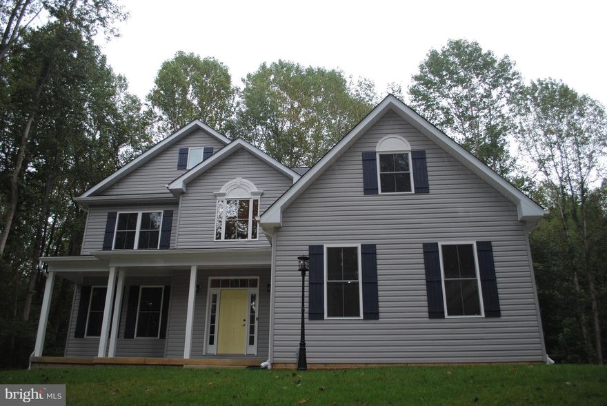 - FRONT PORCH - FAMILY ROOM WITH FIREPLACE - CUSTOM TILE MASTER BATH SHOWER - GRANITE IN KITCHEN - LAUNDRY ROOM ON FIRST FLOOR - PRIVATE EIGHT ACRE LOT -