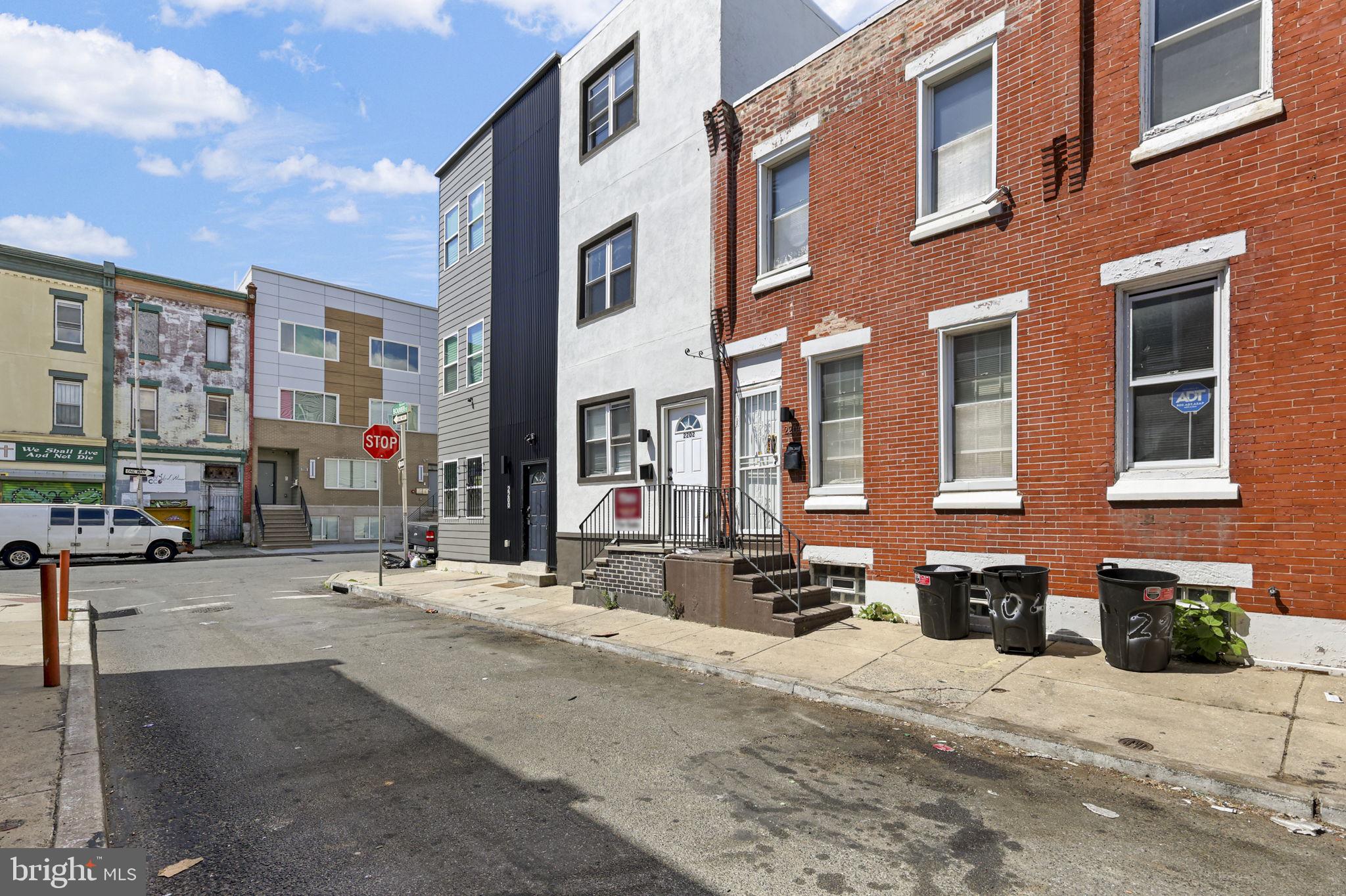 Move in ready large 3 story home located in close proximity to Temple University. Upon entry to the first floor, you ll find an open floorplan design with living space and wraparound kitchen with bar seating, soft-close shaker cabinetry, Calacatta quartz countertops, stainless steel appliance package, and more. In the rear, you ll find a nicely sized ground level bedroom and full bathroom with shower.The next level features 2 bedrooms, large bathroom with tub, and a dedicated laundry closet - machines included. On the top level, you ll discover 3 additional bedrooms and a full bathroom with shower. All bathrooms feature slate gray floor tile, subway tiled shower/tub walls, and modern vanities & hardware. . A full height, clean unfinished basement houses newer mechanical systems - high efficiency heating & AC system, 80 gallon water heater, and 200AMP electrical service with new panel. Perfect for a student rental or a large family. There is a 10 year rehabilitation tax abatement has 5 Years remaining. Buyer s must exercise their own due diligence. Property is currently vacant and ready to show on lockbox. This will be an AS-IS sale.