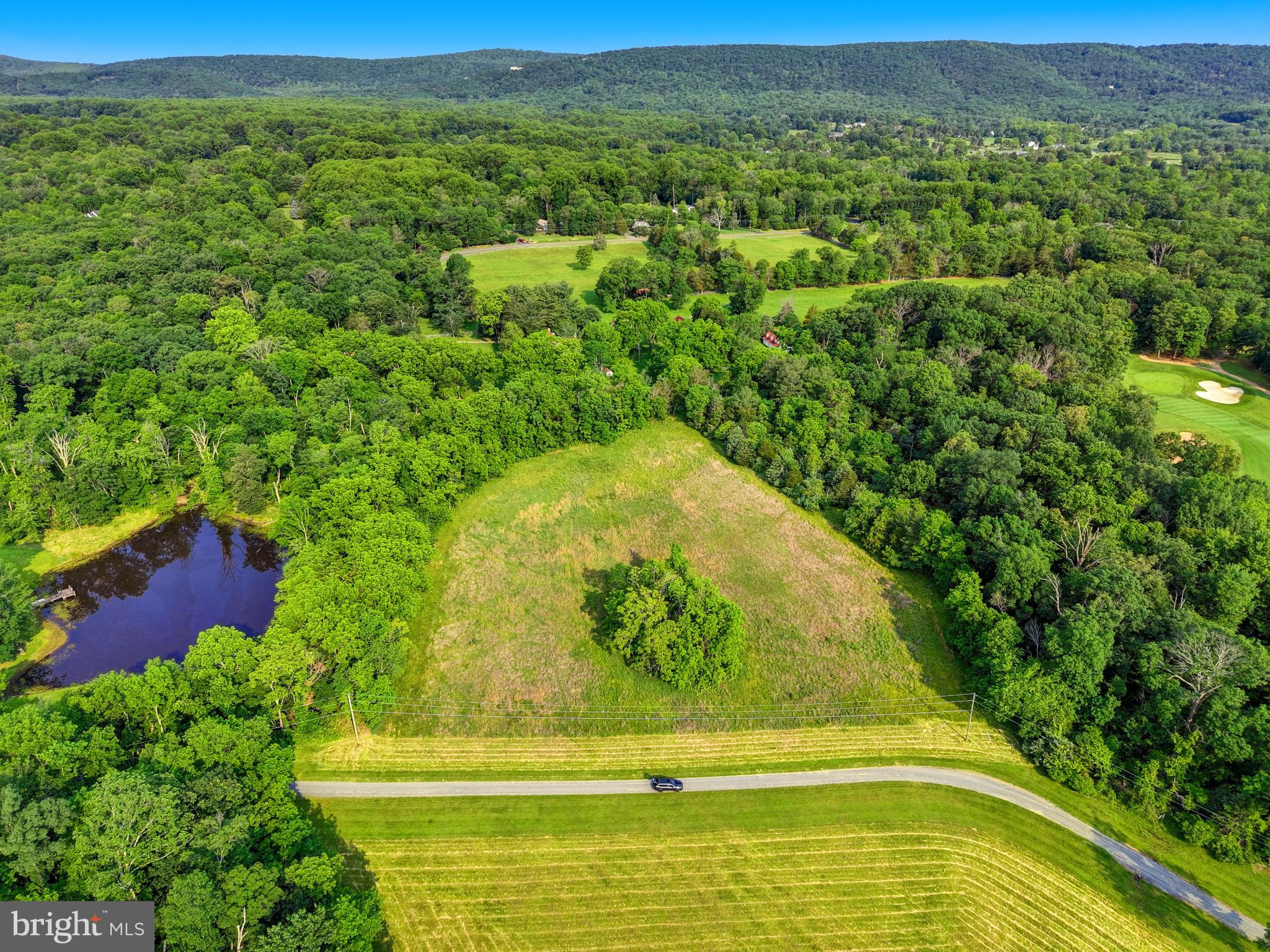 Discover the perfect canvas for your dream home on this gorgeous 5-acre lot in the heart of Haymarket. Nestled adjacent to the prestigious Bull Run Golf Club, this property offers a serene setting with natural beauty and privacy, yet remains close to everyday conveniences. The land has been perc-tested and approved for a 5-bedroom alternative septic system, providing a solid start for your custom build. Ideally located just minutes from Dominion Valley Country Club, Silver Lake Regional Park, shopping, dining, and commuter routes. Whether you're looking to build a private retreat or an elegant estate, this exceptional lot offers both location and potential.