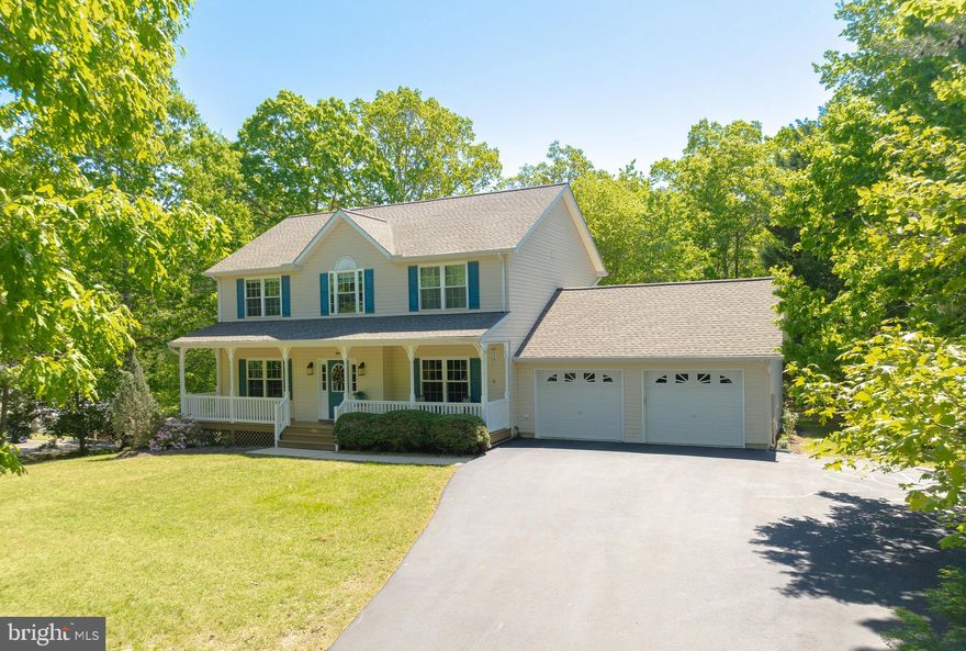 Welcome to this charming 4-bedroom, 3.5-bathroom home nestled in the sought-after Kingston Estates of Leonardtown. Lovingly maintained by its original owners, this house seamlessly blends comfort, convenience and tranquility.

Upon entering, you're greeted by bright and airy living spaces adorned with gorgeous wood floors that flow throughout much of the main level. The heart of the home is the thoughtfully designed kitchen, featuring beautiful oak cabinetry, sleek quartz countertops, a stylish tiled backsplash, and a convenient breakfast bar—perfect for morning coffee or casual meals. Equipped with a double oven, side-by-side refrigerator, and a spacious pantry, this kitchen is as functional as it is attractive. The eat-in area, with its charming bay windows, offers a serene spot to enjoy meals while overlooking the expansive deck and private, wooded backyard. Adjacent to the kitchen, the formal dining room exudes elegance with its oak floors and classic chair rail molding. A versatile flex room with French doors awaits your imagination—ideal for a home office, craft room, or play area.

Upstairs, the generous primary suite serves as a tranquil retreat, boasting a large soaking tub with serene backyard views, a separate shower, double sinks, and a walk-in closet—all accented with updated fixtures. Three additional spacious bedrooms provide ample space for family or guests. The convenience of a third-floor laundry area adds to the home's practicality.

The walk-out basement reveals a large, versatile area—perfect for a media room, gym, or additional living space. A cozy gas fireplace adds warmth and ambiance, making it an ideal spot for relaxation. An extra room offers flexibility as an office or craft room, complemented by a full bathroom for added convenience.
Outdoors, relish in the serenity of a wooded backyard with no rear neighbors, offering unmatched privacy. Choose between the inviting front porch, expansive back deck, or charming paver patio—ideal for entertaining or quiet reflection. The nearly 0.80-acre lot is adorned with mature trees and thoughtful landscaping, enhancing the home's natural beauty.

Additional features include a newer roof, newer high efficiency Trane HVAC systems, under deck storage and a spacious 2-car garage. This exceptional Kingston Estates home offers a perfect blend of elegance and comfort—don't miss the opportunity to make it your own!